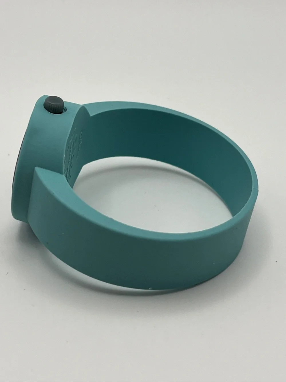 O bag O clock Modular Silicone Watch with a mint green strap